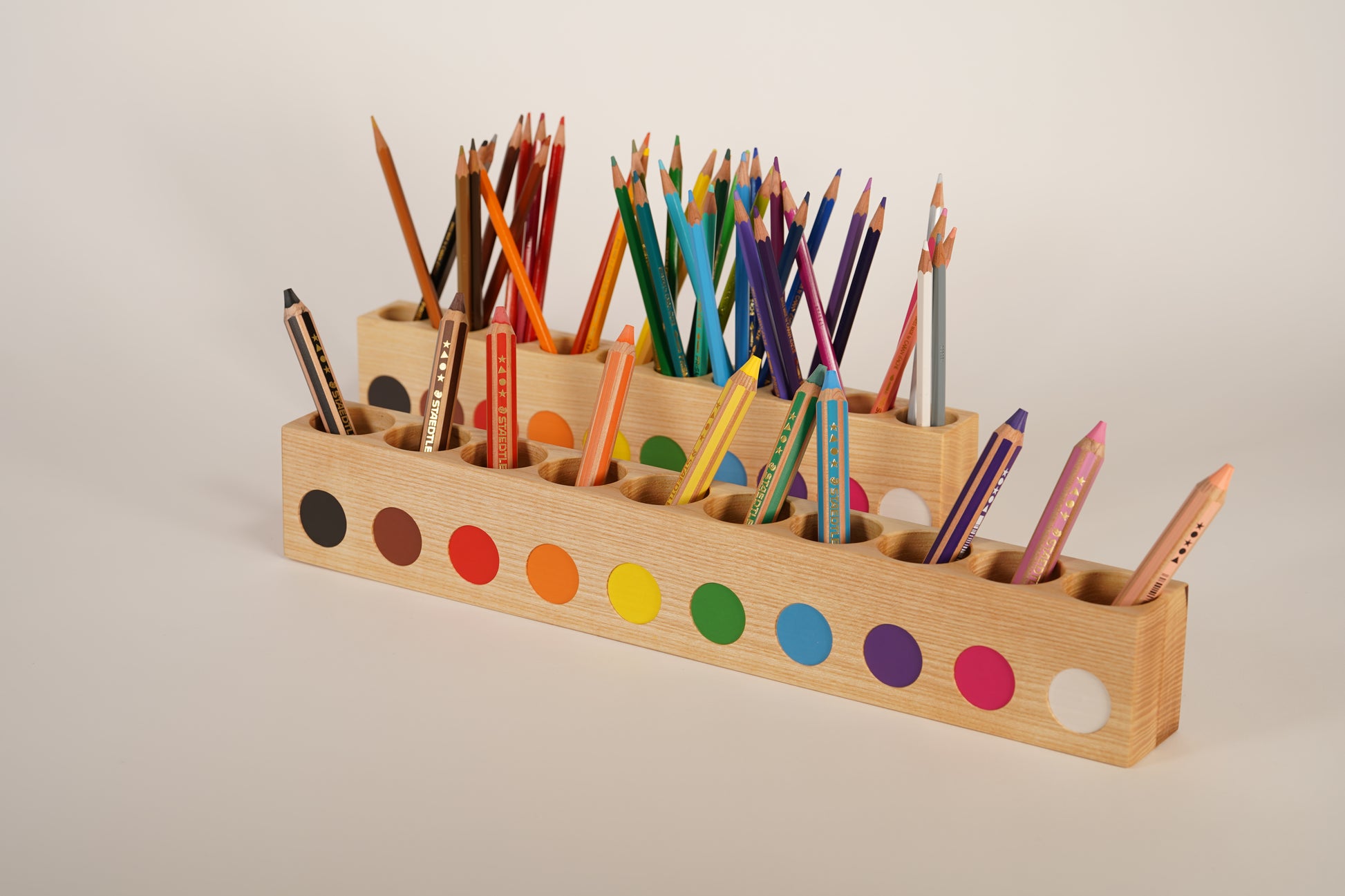 Large montessori pencil holder, with staedtler noris pencils for small kids, compared to regular pencil holder side angled view