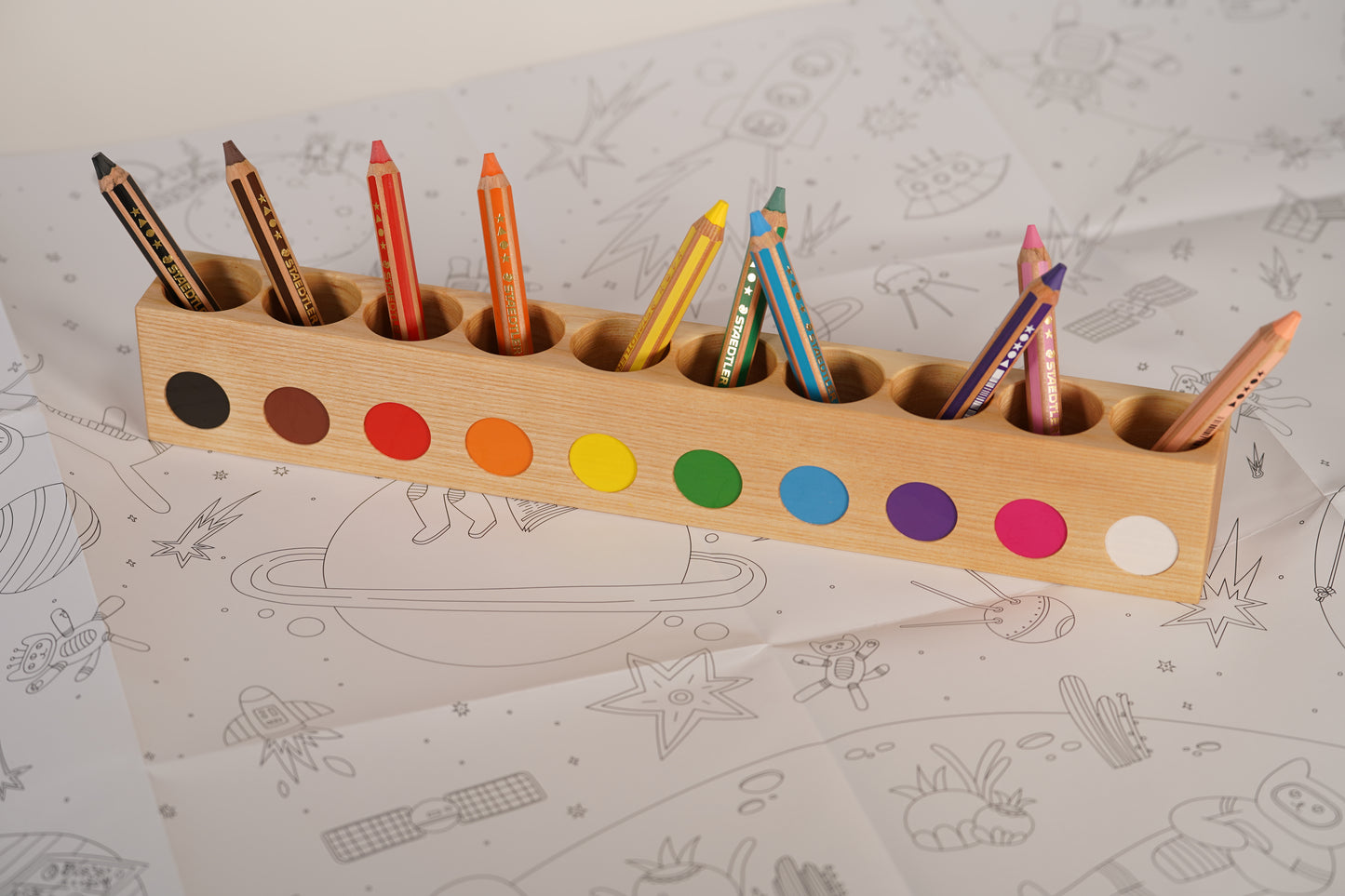 Large montessori pencil holder, with staedtler noris pencils for small kids, on top of giant coloring poster space kittens