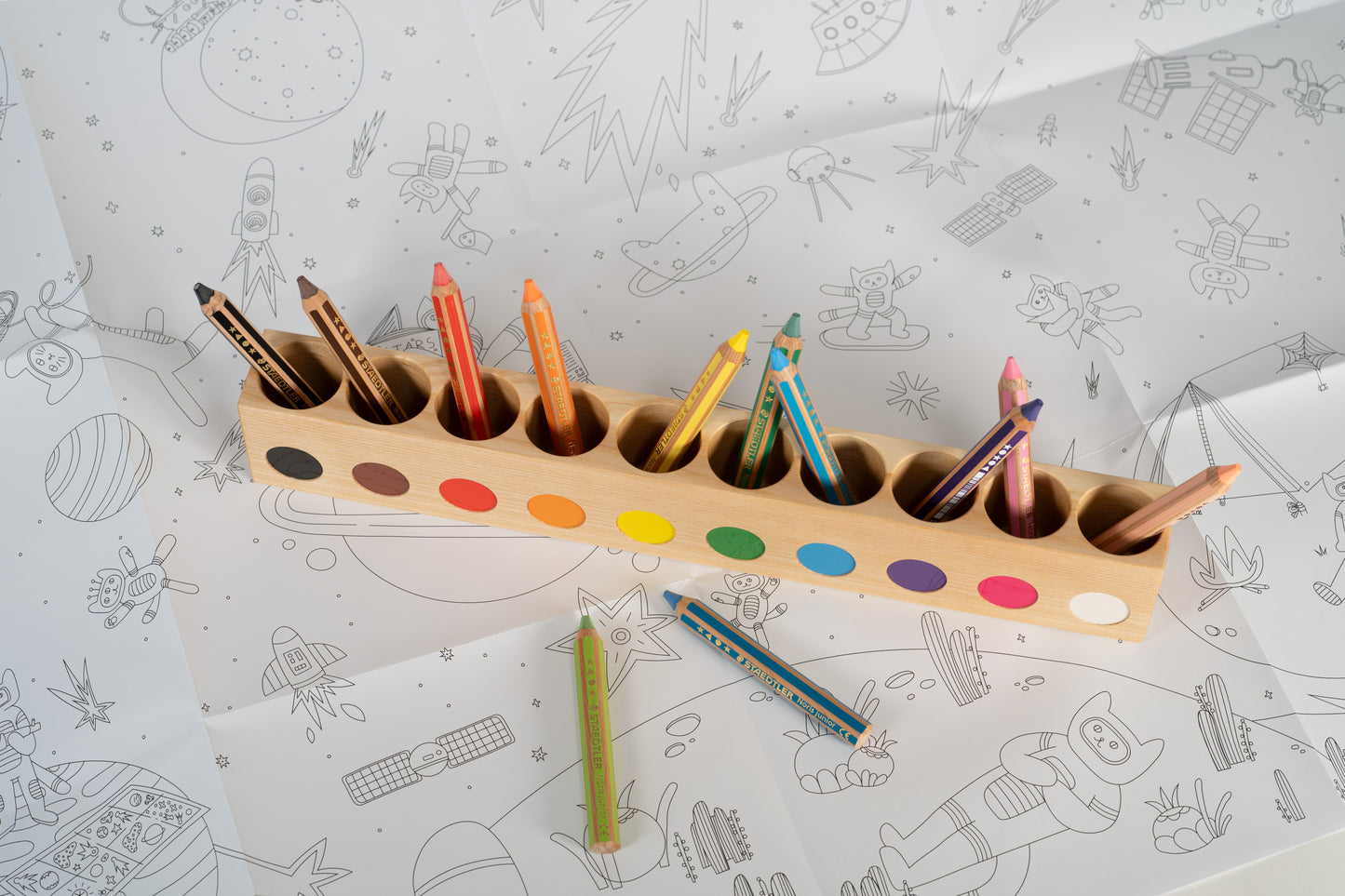 Large montessori pencil holder, with staedtler noris pencils for small kids, on top of giant coloring poster
