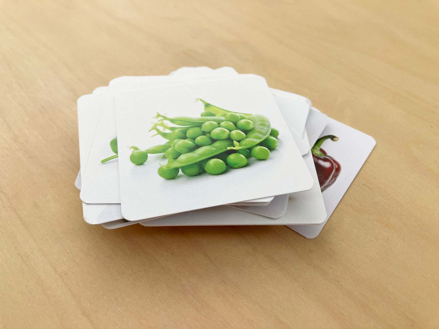 Montessori Fruits and vegetables flashcards in a pile
