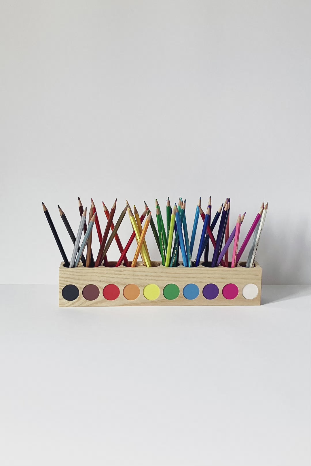Double sided montessori pencil holder, rotating gif.