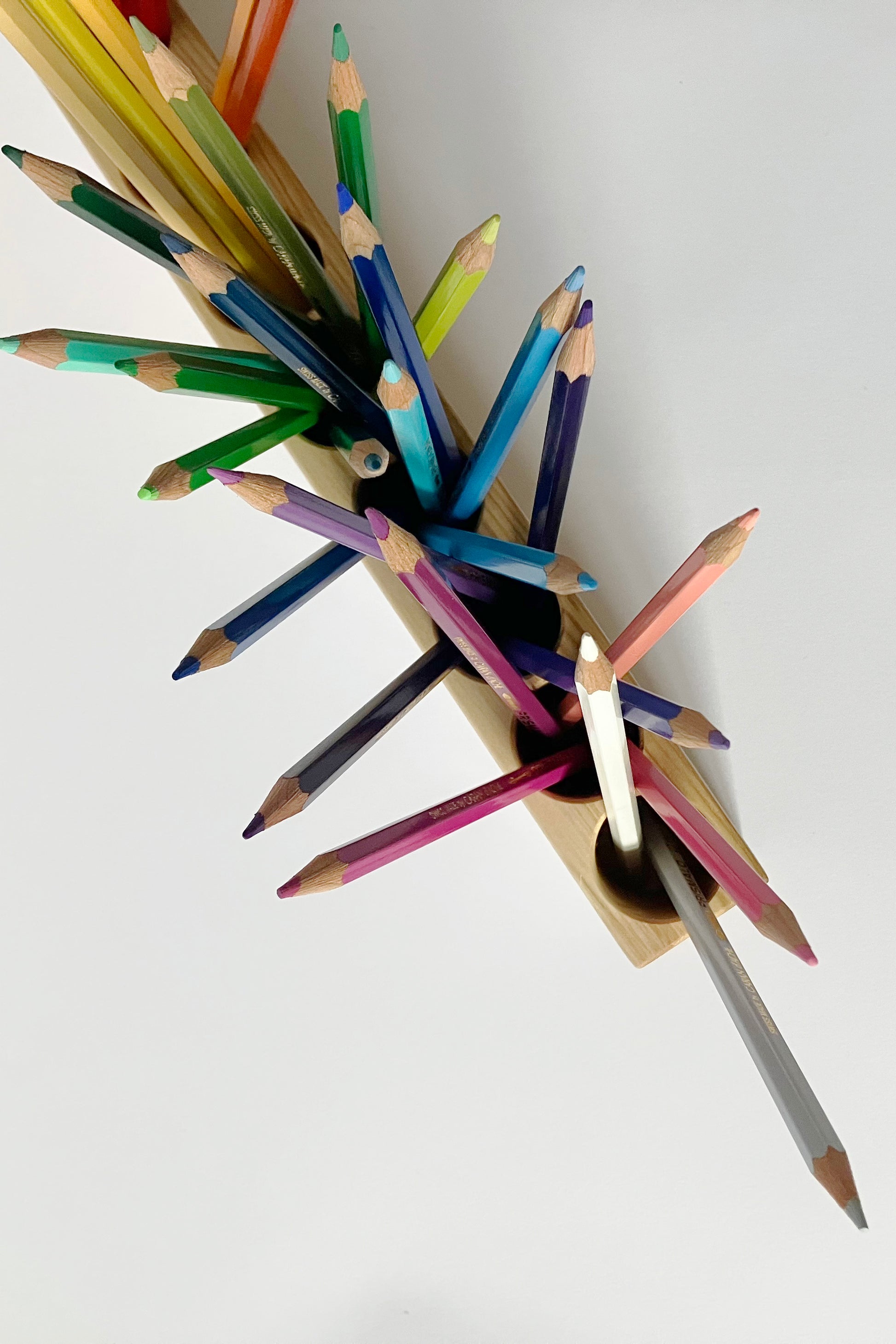 Montessori pencil holder, top view, white background